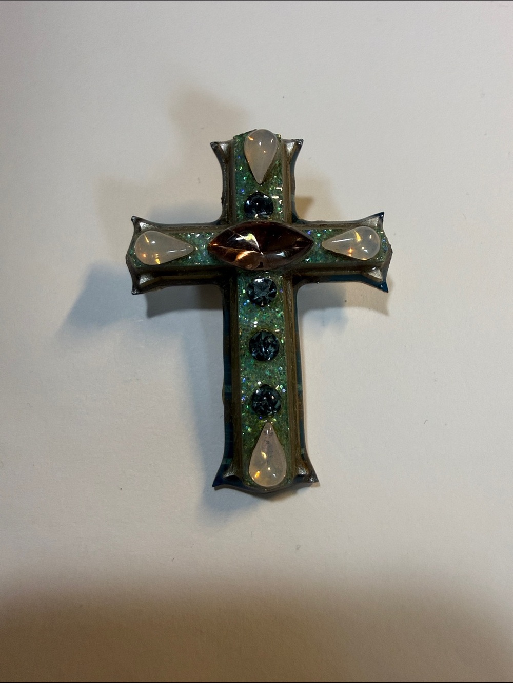 Decorative Green Cross with Gem Accents, can be worn as a necklace or a pin!